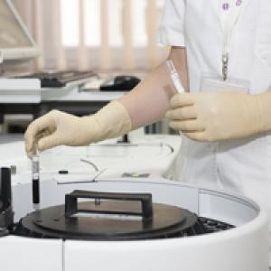Medical professional using equipment