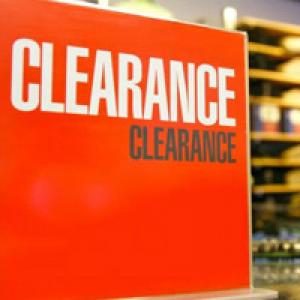 Red clearance sign in shop