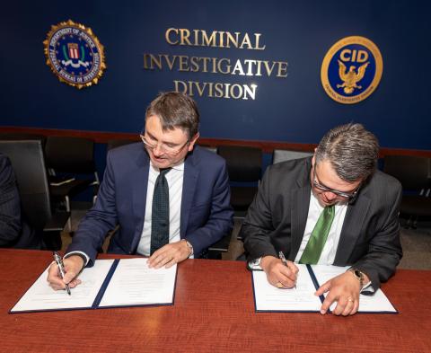 FBI Public Corruption and Civil Rights Section Chief John Jimenez signed the MOC with ACCC's Marcus Bezzi (on left)